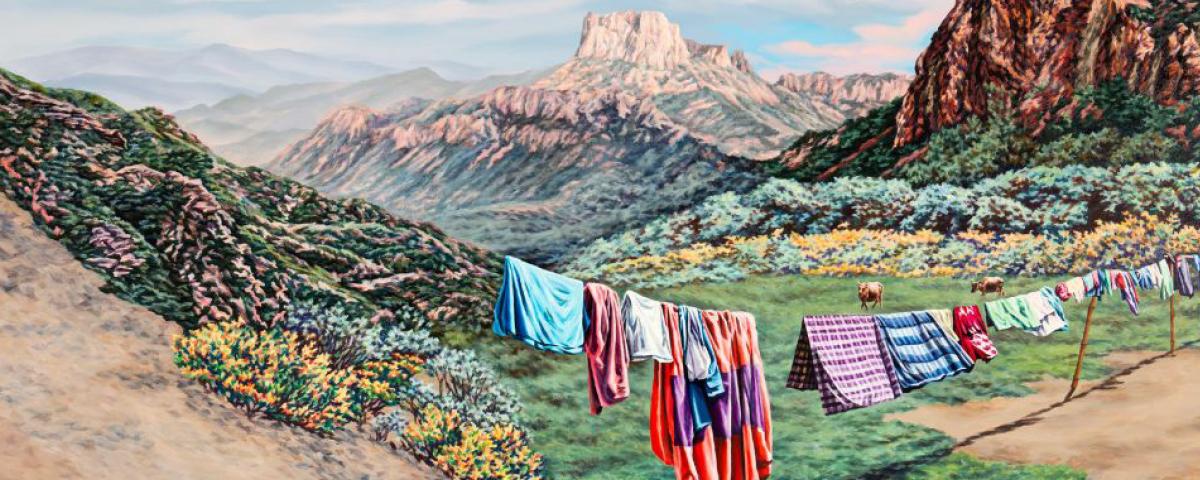 Detail from painting Out Back by Kevin Chin shows washing line hung with coloured items draped in front of mountain range.
