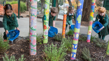 school children gardening