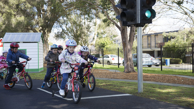 Children riding bikes at Kew Traffic School