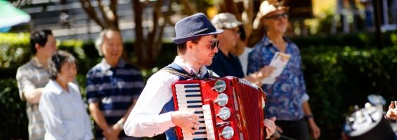 Guests enjoying music at a local park