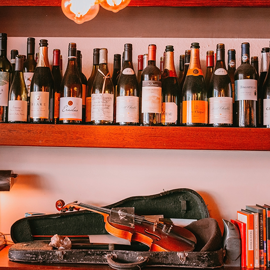 Violin in the window of a bar