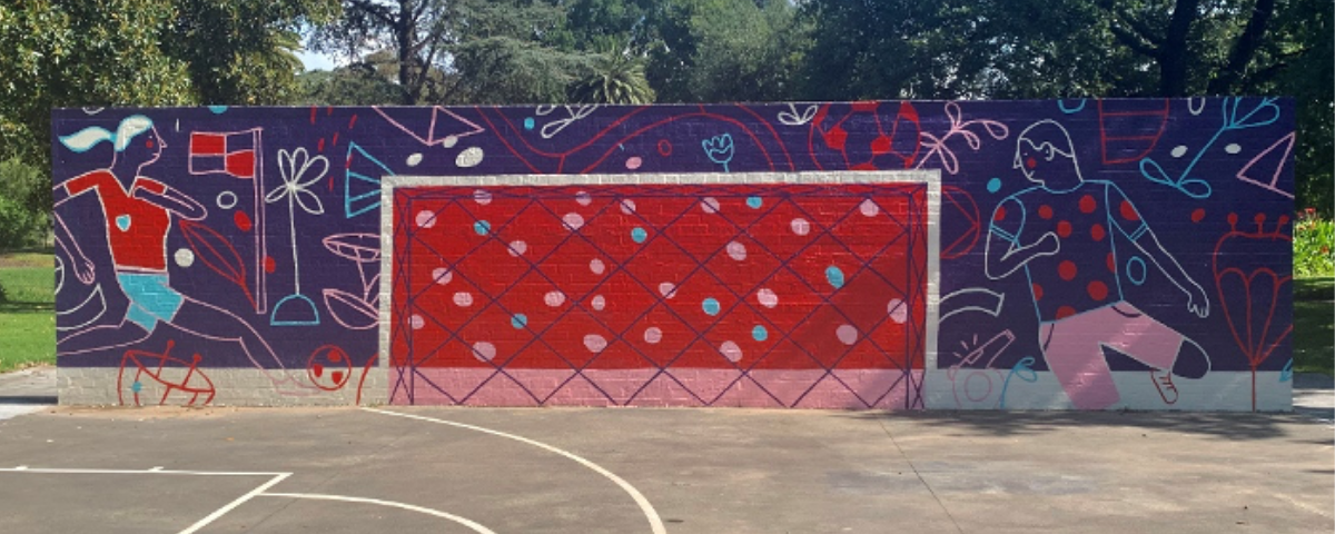 Mural of a soccer net and two people kicking a ball