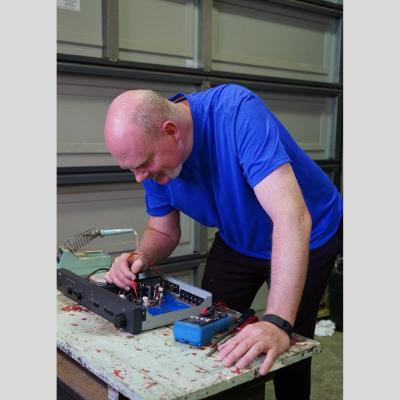 Photo of Andrew Tynan working