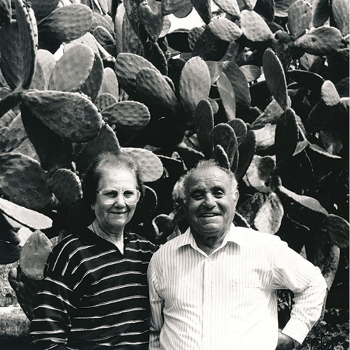 A black and white photo of a man and a woman