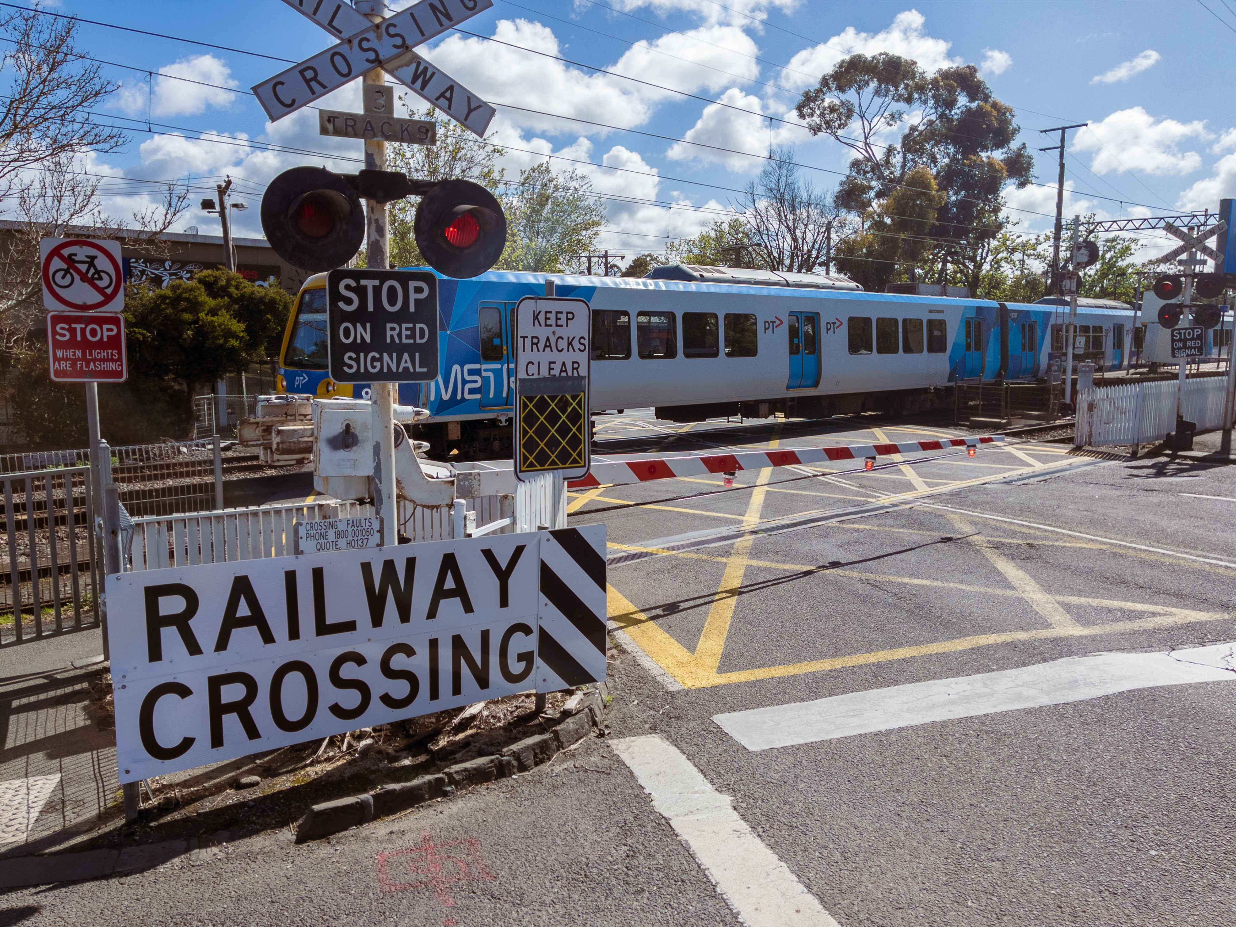 A train going through the current surrey hills level crossing on union road