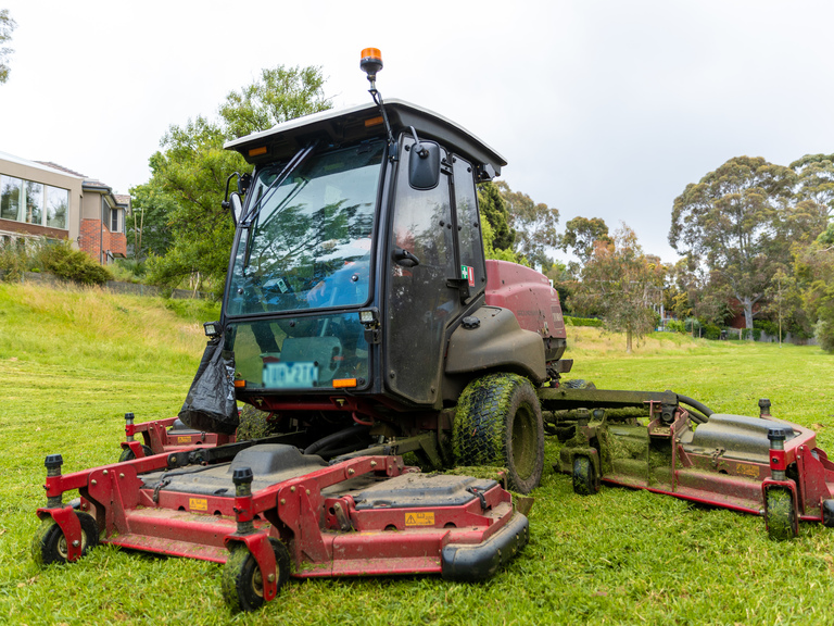 Large mowing equipment at a park