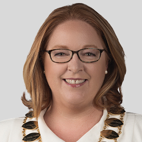 Councillor Felicity Sinfield smiling and wearing a white top and the mayoral civic regalia