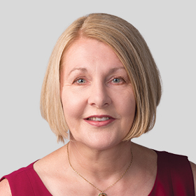 Councillor Lisa Hollingsworth smiling and wearing a pink top and a necklace