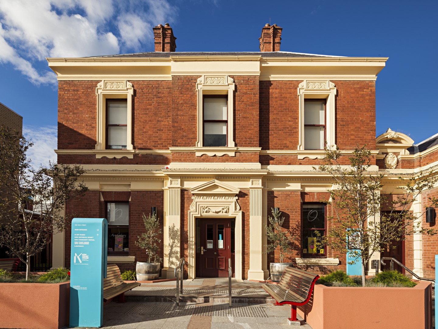 The exterior of Kew court house showing a two storey brick building