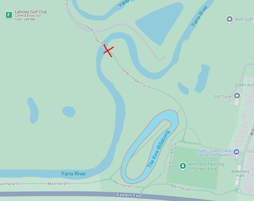 Aerial map of parkland with a red X marking meeting point