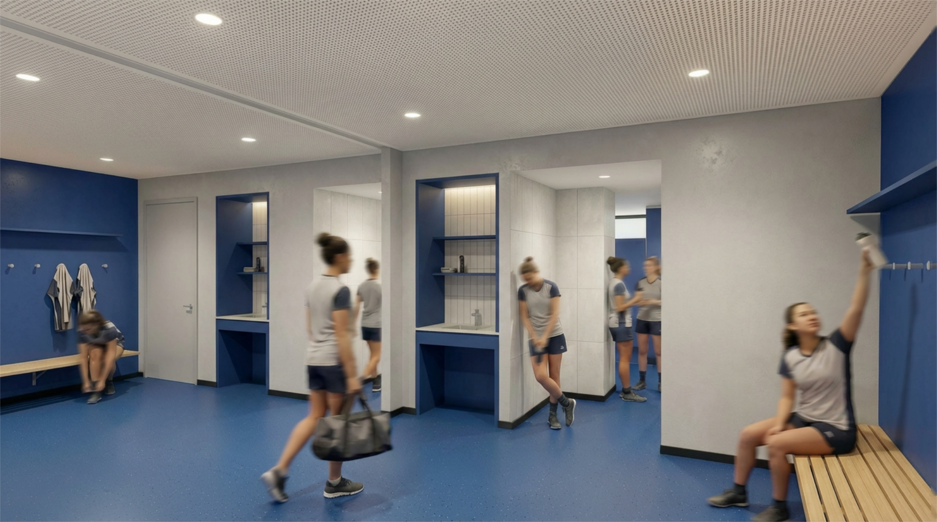A blue floored changing area with benches and hooks on the walls. 