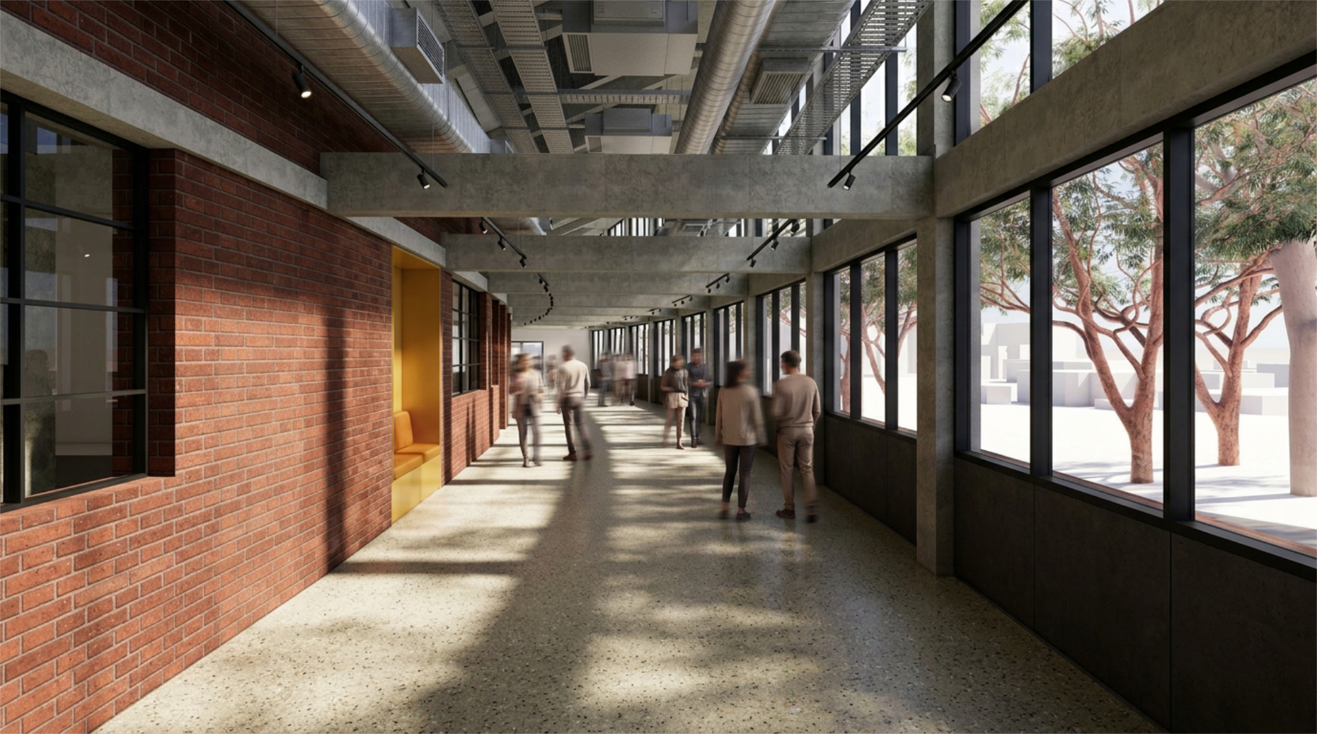 The enclosed ground level of the stand, a wide walkway with large windows looking out to the grounds.