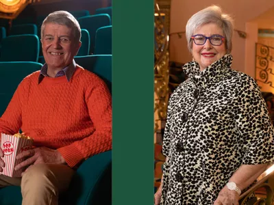Four older people at the movies, some holding popcorn and others seated