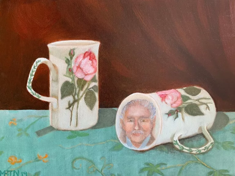 Two painted cups on a table
