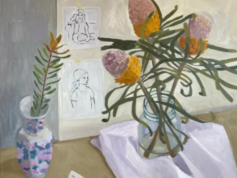 Painting flowers in vases and an opened book