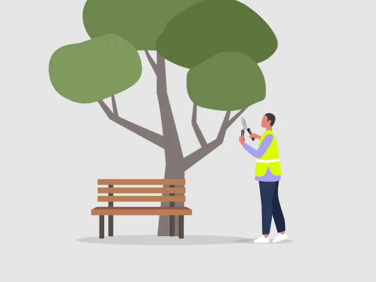 A man in a yellow hi-vis vest using gardening tools to prune a tree in a park