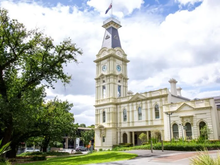 The Camberwell Civic Precinct building showing the gardens surrounding as you approach the clocktower on the corner of the precint
