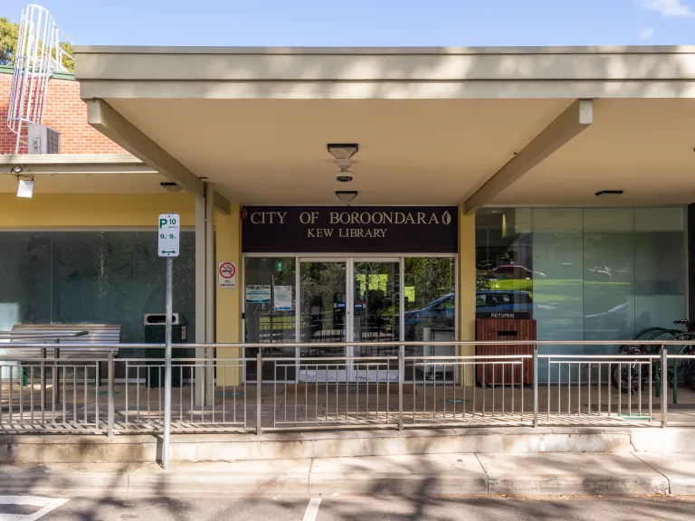 the main entrance of Kew Library painted in a dated pale yellow.