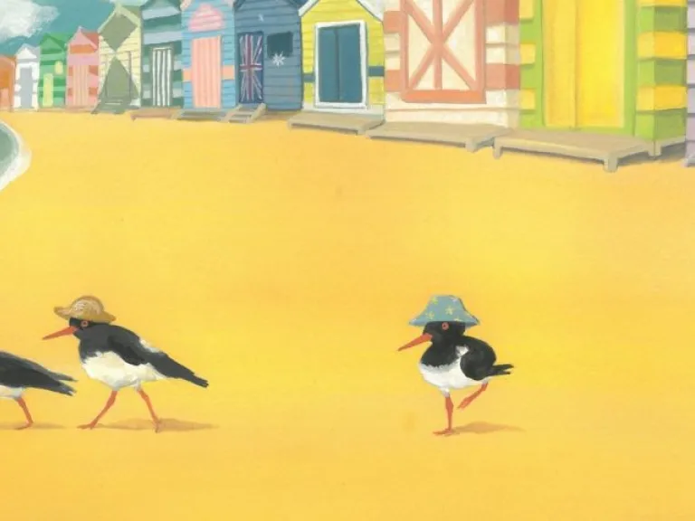Digital illustration of a row of brightly coloured beach huts lines a sandy shoreline under a turquoise sky with white clouds. Four black-and-white shorebirds walk along the sand in the foreground, each wearing a different hat or accessory. Waves lap the edge of the beach on the left. 