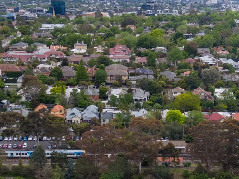 Arial view of a residential area alongside a trainline.
