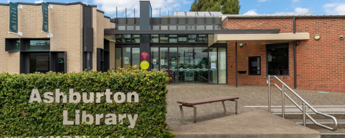 Exterior of Ashburton Library including stairs and brick facade
