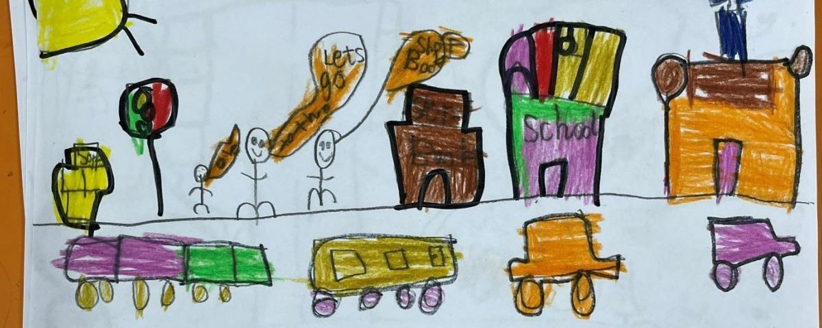 A child's drawing of cars driving down a road past buildings and a school