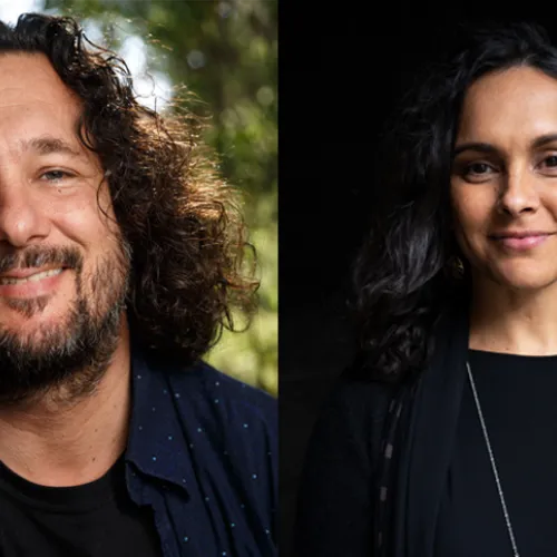 Two images side by side. First image is a close up of a male with dark, shoulder length hair and a beard looking at camera. Second image is a female with long dark hair and is smiling.