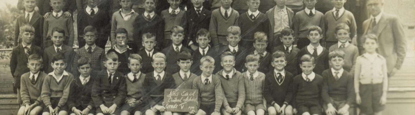 Black and white photo of school class