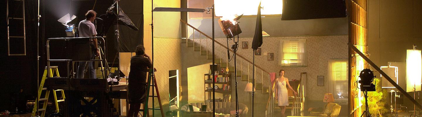 a brightly lit film set built to resemble the inside of a house