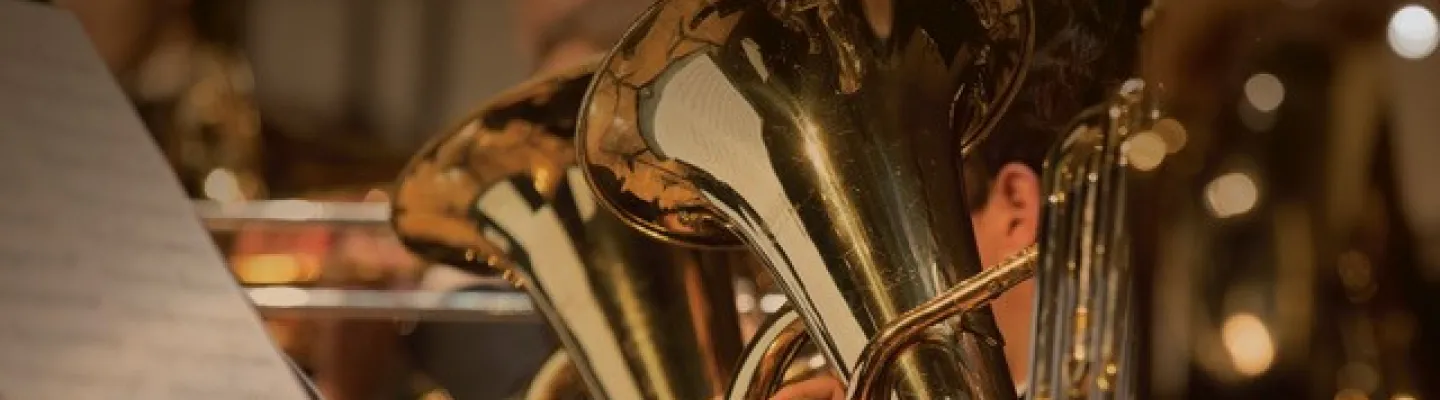 Two gold trumpets.