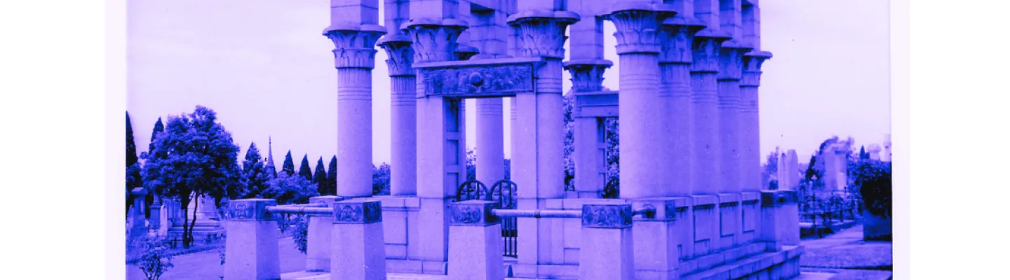 A purple and white image of a large Egyptian tomb with large decorative pillars