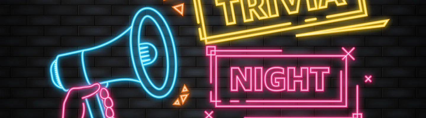 A neon sign shows a loudspeaker with the words 'Trivia Night'