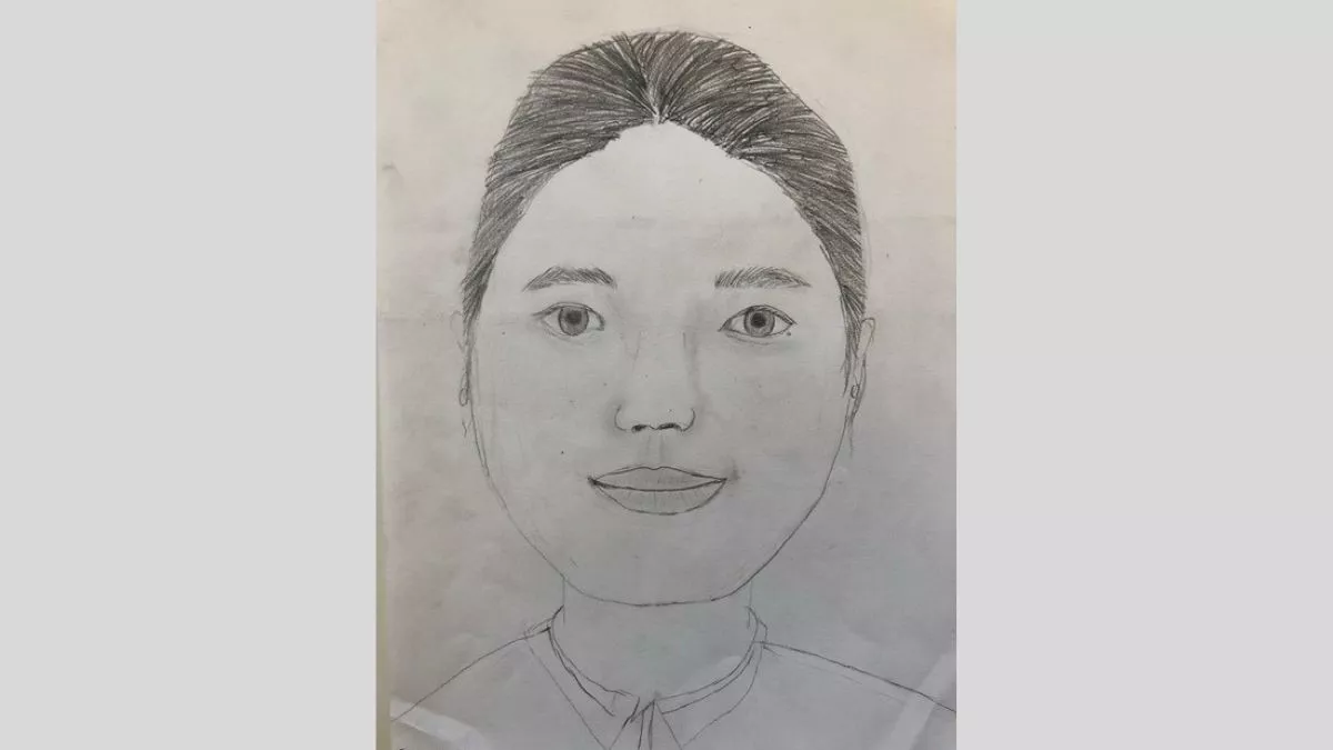 Self portrait by Eleorna, done with grey lead pencil on paper.