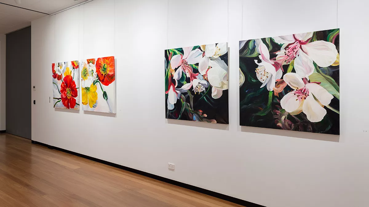 Installation view of 'Natural Constructs' at Town Hall Gallery. Close up paintings flowers by Shani Alexander.