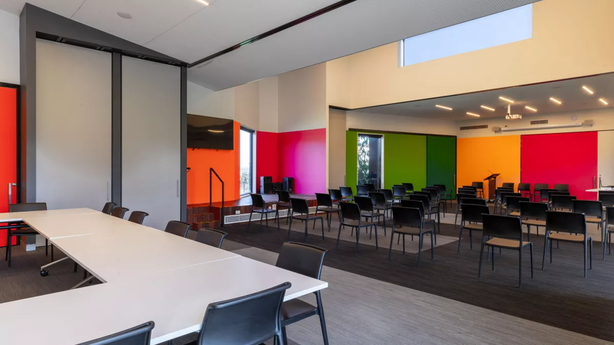 A large meeting room set up for two meetings
