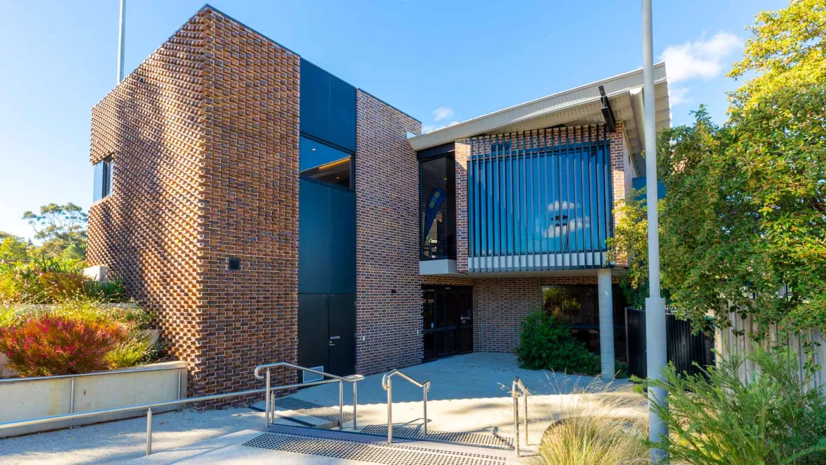 The outside of a brick office building