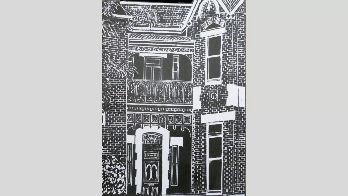 A white outline of a old two story housefront with tall windows in the brick walls and showing the entrance