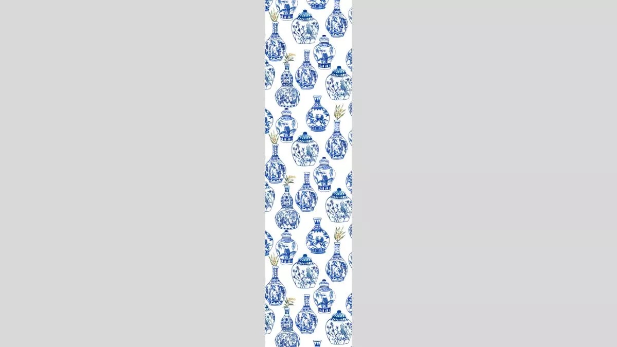 Blue and white painted vases on a white background in a repeating pattern