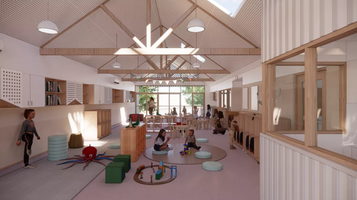 Artist's impression of the refurbished playroom at the JJ McMahon kindergarten, a large open playroom with exposed roof joints, natural materials and white walls, and children playing with toys and kindergarten staff
