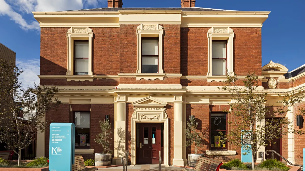 The exterior of Kew court house showing a two storey brick building