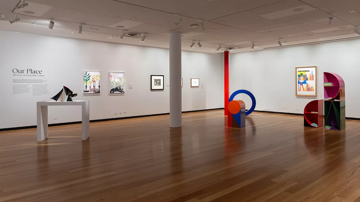 view across the gallery to the exhibition title on the wall