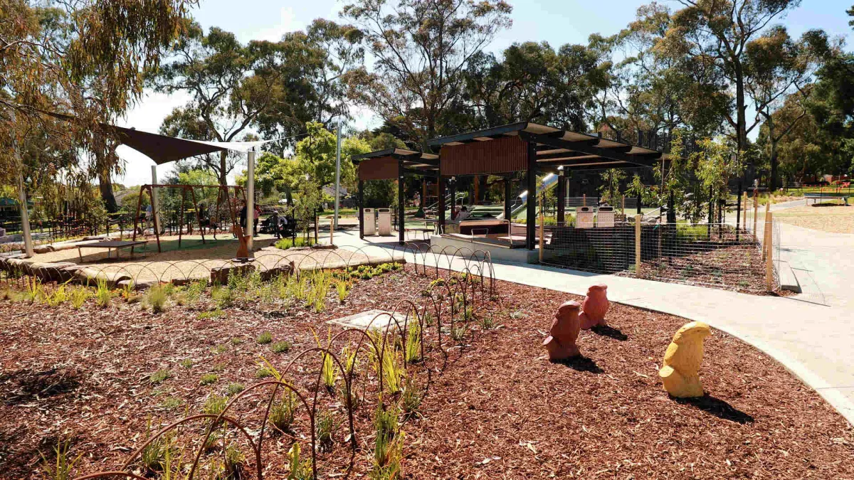 Undercover seating areas surrounded by mulched gardens