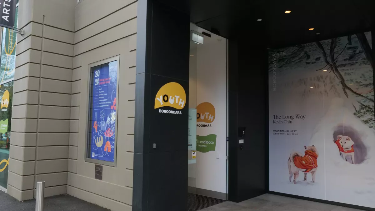 Entrance to Boroondara Youth Hub. A glass sliding door.