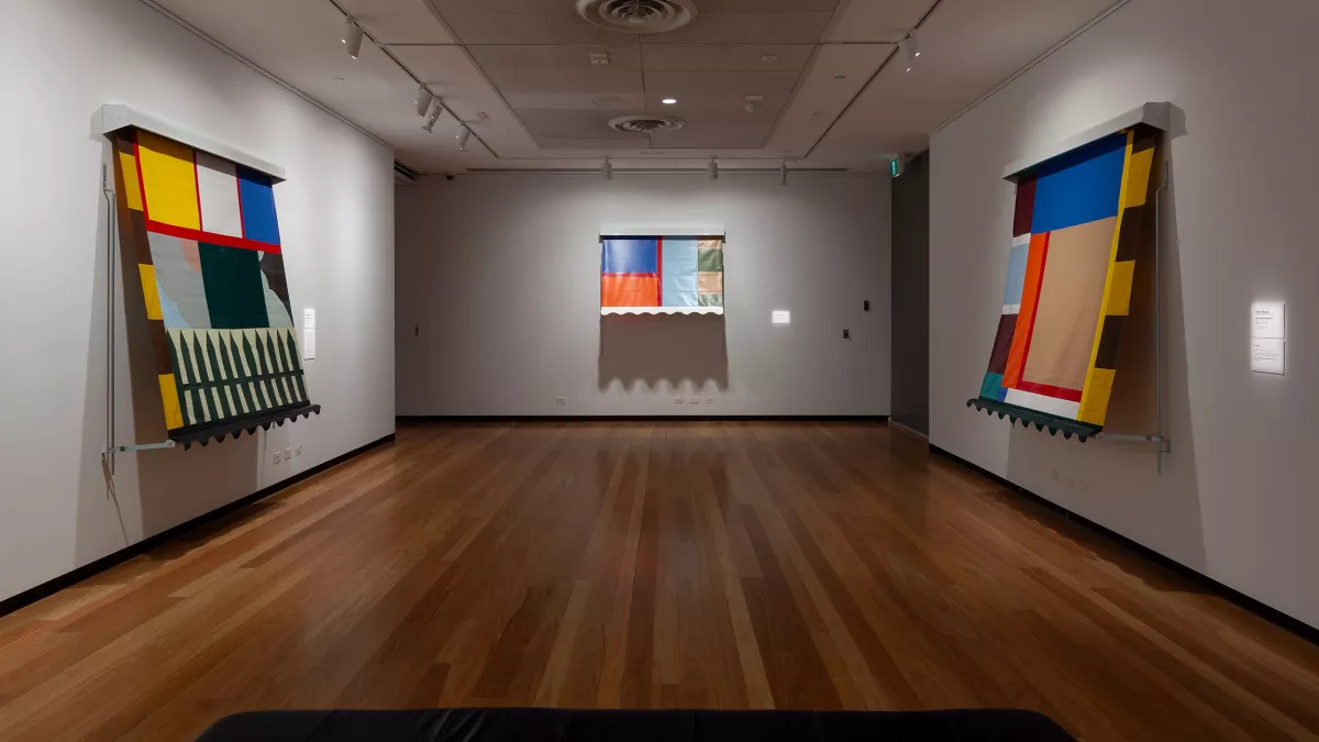 Photo of  mixed media work in a gallery. 