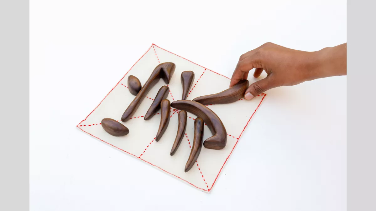 Walnut wood sculpture of a Chinese character