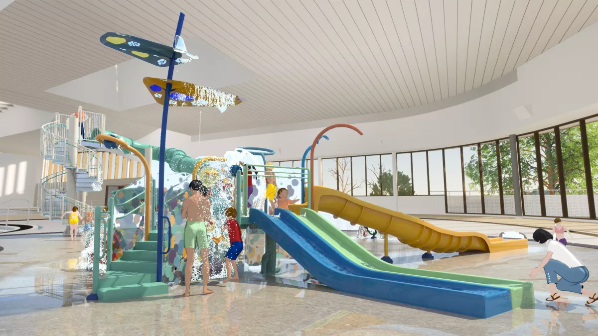 Artist render of an indoor water slide and play area for small children