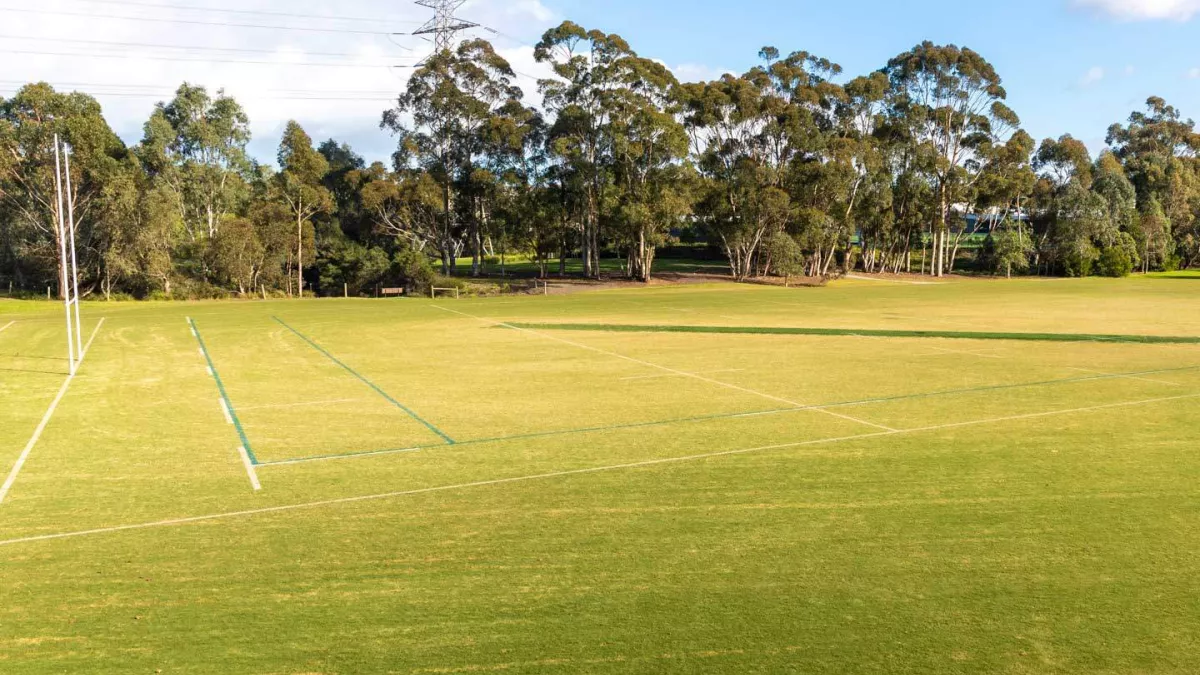 A rectangular sportsground featuring rugby goal posts