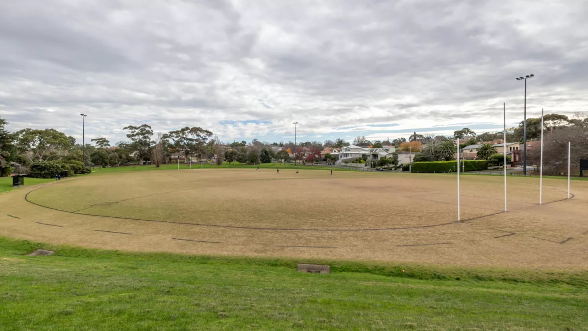 A circular sportsground with AFL goal posts