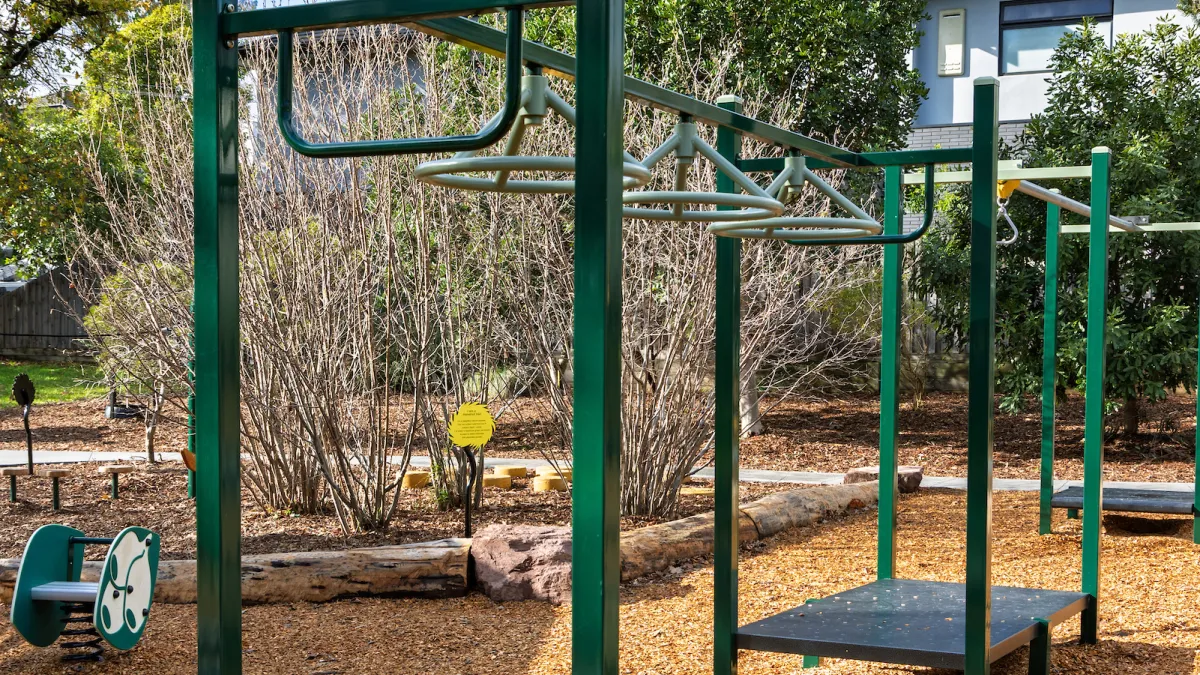 Monkey bars at a barkchip playground
