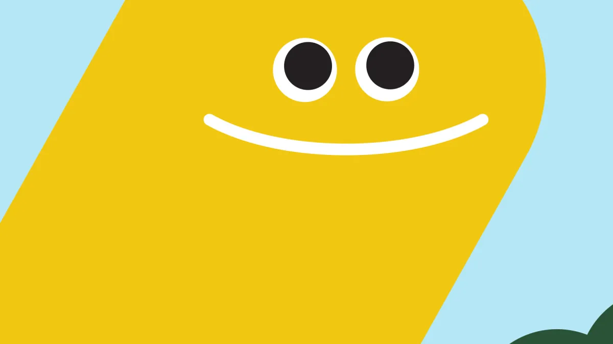 A smiling yellow worm-like shape